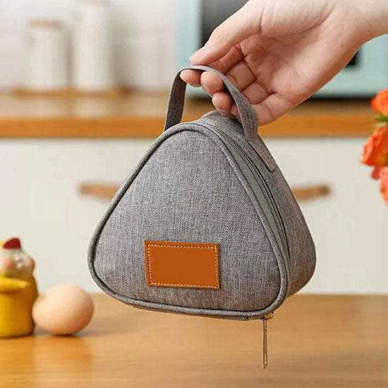 tenir un sac isotherme triangulaire